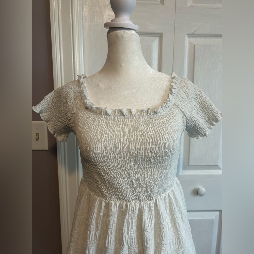 White Mini Sundress with Tiered Skirt and Off-the-Shoulder Neckline - Picture 8 of 12